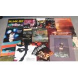 A box of promotional music posters. Includes Led Zeppelin, Iron Maiden, Pink Floyd etc.