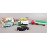 A group of Dinky toys vehicles. A boxed Spectrum pursuit vehicle No. 104, boxed Refuse wagon 978,