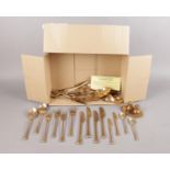 A quantity of bronze cutlery - to include knives, forks, spoons (60 pieces) & cruet set on a tray.