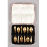 A cased set of six gold plated Auphir coffee spoons.