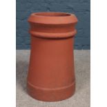 A terracotta chimney pot/garden planter. (Height 47cm).
