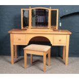 A collection of Beech bedroom furniture - comprising of a dressing table with matching stool,