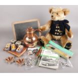 A box of miscellaneous collectables. Includes Harrods millennium bear, baby spoon and pusher, 19th