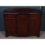 A Mahogany sideboard. Three drawers above cupboards. (116cm width, 84cm height, 37cm depth)