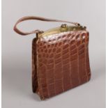 A ladies vintage crocodile skin bag. Retailers label for Lily Shoes.