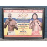 A framed boxing poster. Evander Holyfield vs Lennox Lewis, Madison Square Garden, 1999.