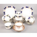 A collection of mainly Warwick bone china teawares. Also includes similar Royal Albert cup and two