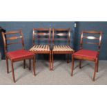 A set of four mahogany dining chairs.
