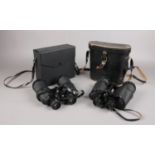 Two cased pairs of binoculars. Includes Super Zenit 20x50 and Omiya 10x50. Interior optics of