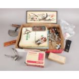 A box of collectables. Includes Corgi Chitty Chitty Bang Bang, vintage football pump, car workshop