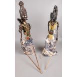 A pair of Indonesian ebonised puppets.