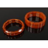 Two bronze amber polished block elasticated bracelets the widest is 20cm Good condition