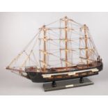A model wooden ship. 'Spanish frigate' (42cm height 58cm length)
