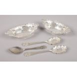 A small collection of silverplated items. Includes a pair of pierced bon bon dishes and three