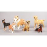 A group of Beswick dog figures. Collie Large & small, Dachshund, Brown Terrier, Mini Pinscher (