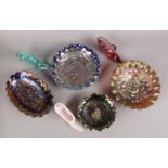 A collection of glass wares. A Fenton Amethyst carnival bowl with grape design, three Fenton glass