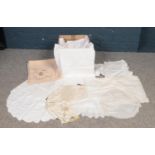 A box of assorted vintage table linen - comprising of table runners, linen centre pieces, and