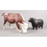 Two Beswick cattle figures. Aberdeen Angus Bull (Matt) & Brown & White horned Cow. (original boxes)