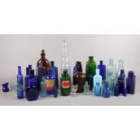 A collection of vintage glass/chemist bottles.