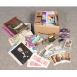 A box of miscellaneous, mainly ephemera. Includes Triang railway, postcards, stamps etc.