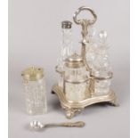 An assembled silver cruet set. Assayed London 1839 by Edward, John & William Barnard. Damage to some