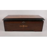 A late 18th C/Early 19th C Swiss inlaid Rosewood Music box. the hinged lid enclosing music box