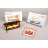 A group of Tram collectables .Tin Plate Wind up Tram with Key, Tower Trams 1.76 scale plastic