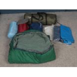 A vintage six man tent and contents. To include two mattresses and three sleeping bags etc.