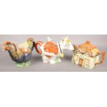 Three ceramic novelty teapots. Including Rooster, Cow and Cottage.