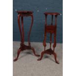 A Mahogany plant stand with two drawers (85cm height) & one similar example