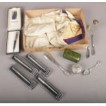 A box of collectables. Including Masonic apron, Parker pens, collectors spoons, silver handled