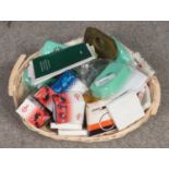 A basket of lawnmowers spares. Includes piston rings, diaphragms etc.