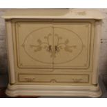 An Italian style cabinet with brass diamante handles. (91cm x 98cm x 56cm)