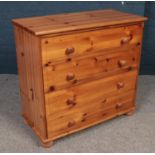 A pine chest of four drawers. (Height 76cm, Width 80cm, Depth 40cm).