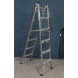 A pair of Aluminium step ladders. H: 189cm. Condition good.