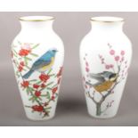 A pair of Franklin Mint vases. Japan design, decorated with birds. (30cm tall)