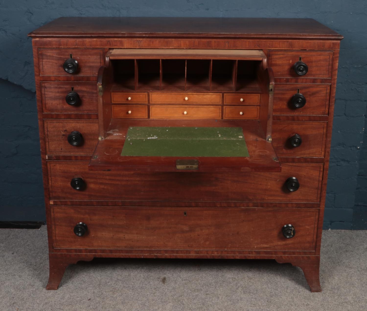 A George III mahogany secretaire chest of drawers. (116cm x 125cm x 57cm). Back leg off. Damage to - Image 2 of 2