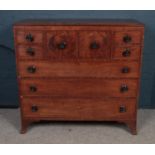 A George III mahogany secretaire chest of drawers. (116cm x 125cm x 57cm). Back leg off. Damage to