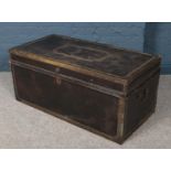 A large 19th century leather bound camphor wood twin handled trunk with stud decoration (Height 47cm