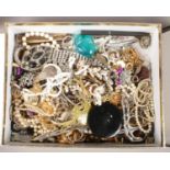 A box of mostly costume jewellery. Including small quantity of silver jewellery, beads, earrings,