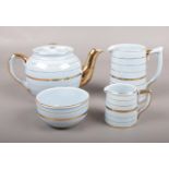 A Sadler four piece tea set. (1406) teapot, sugar bowl, two jugs. chip on end of spout of teapot
