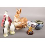 A collection of ceramics. Including Royal Doulton ceramic lady 'Genevieve', Michal Caugant ceramic