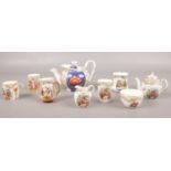 A group of miniature continental part tea sets. Teapots, jugs, sugar bowl.