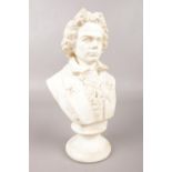 A plaster bust of Beethoven unnamed. H: 23cm. Condition fair. A few cracks.