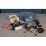 A basket of electrical tools and hardware. To include Black & Decker drill, a black & Decker