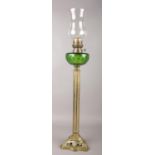 A Victorian brass & glass oil lamp. 83cm height.