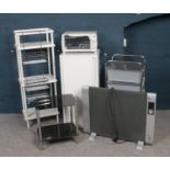 Madodo UV Sterilizing unit together with other hairdressing equipment, metal cabinet, storage