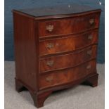 A mahogany serpentine chest of 4 drawers.