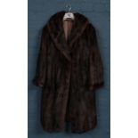 A selection of fur clothing. To include a Mink hat from Kates Boutique in Canada, a 3/4 fur coat and