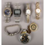 A collection of watches. Including Ingersoll pocket watch, Seiko digital wristwatch, Lucerne
